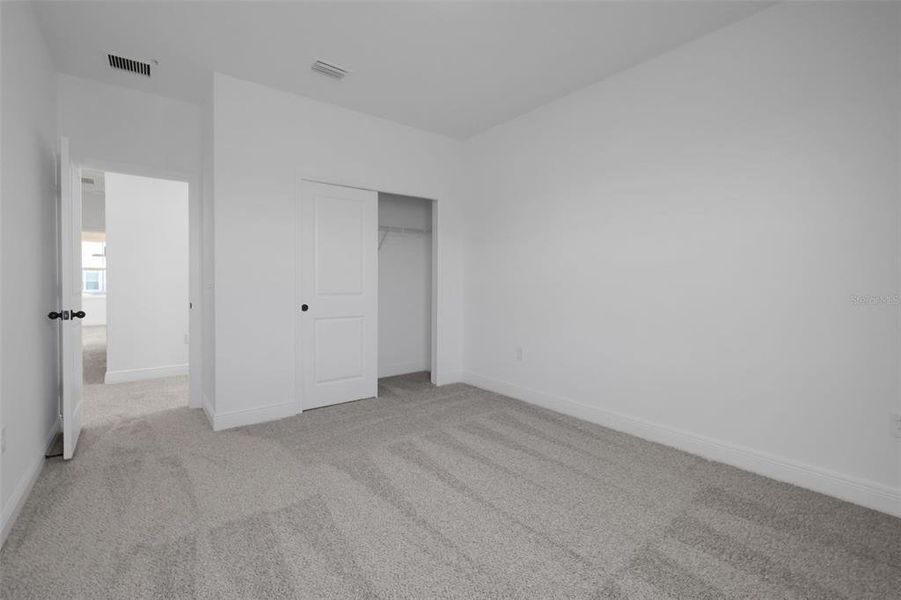 Spacious, unfurnished interior of a new home in Serenade at Ovation, Winter Garden (Image 20). Spacious, unfurnished interior of a new home in Serenade at Ovation, Winter Garden (Image 20).