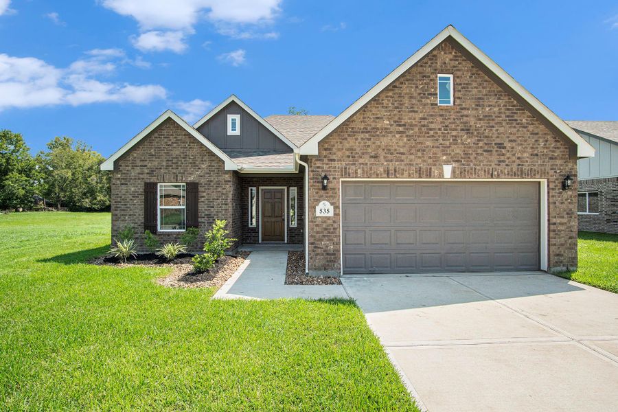 Front exterior of a new home in Columbia Lakes, West Columbia, TX, highlighting curb appeal (Image 16). Front exterior of a new home in Columbia Lakes, West Columbia, TX, highlighting curb appeal (Image 16).