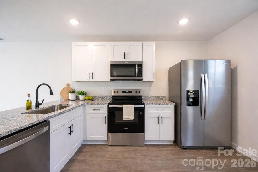 Furnished interior view inside a new home in , Hickory (Image 7).