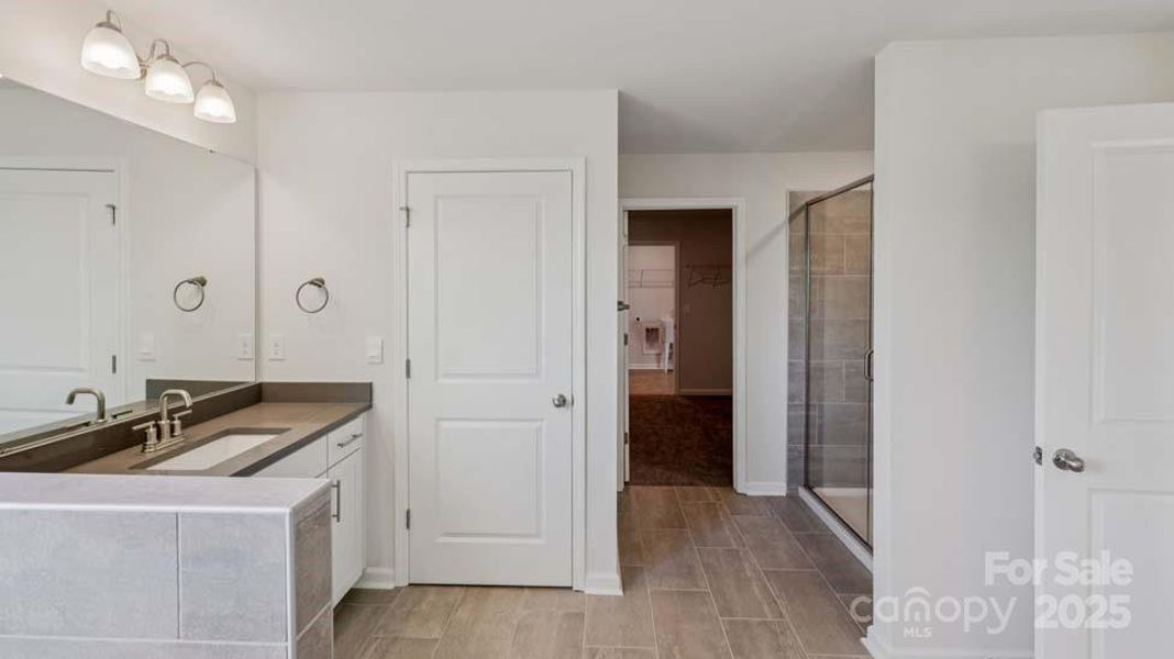 Furnished interior view inside a new home in Sylvan Creek, Denver (Image 14).