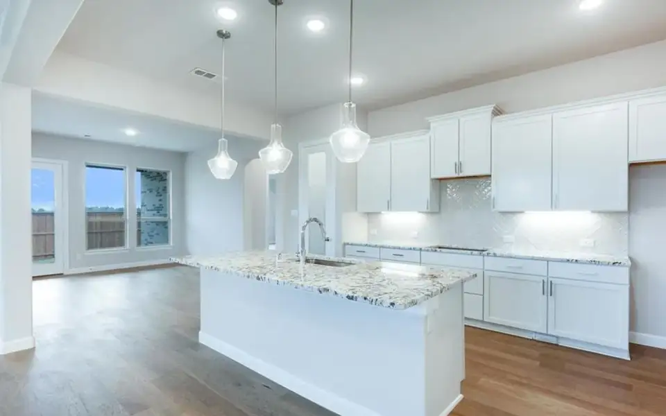Representative furnished interior of a home built from the Santa Barbara by CastleRock Communities in Lakesong, Grand Prairie (Image 5).