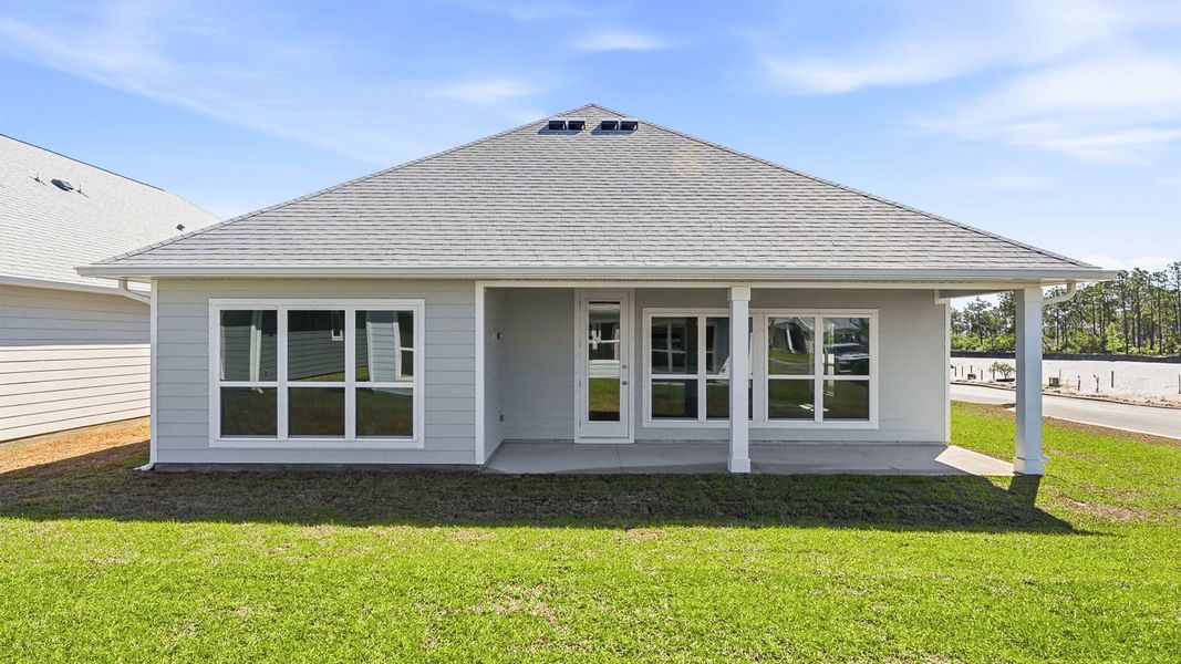 Exterior details and patio area of a home in WindMark Beach, Port Saint Joe (Image 4).