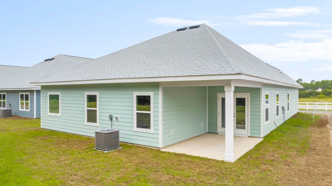 Exterior details and patio area of a home in Buffer Farms, Port Saint Joe (Image 2).