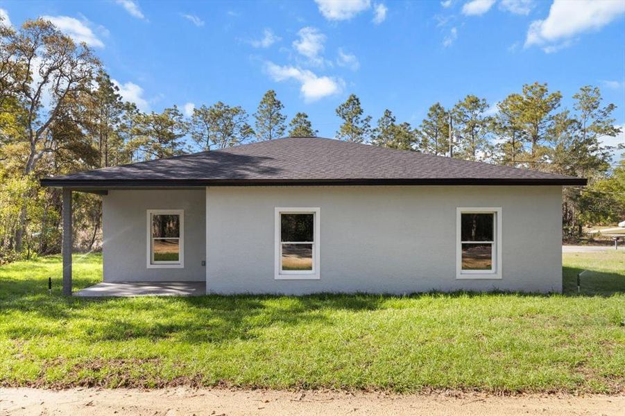 Front exterior of a new home in , Inverness, FL, highlighting curb appeal (Image 2).