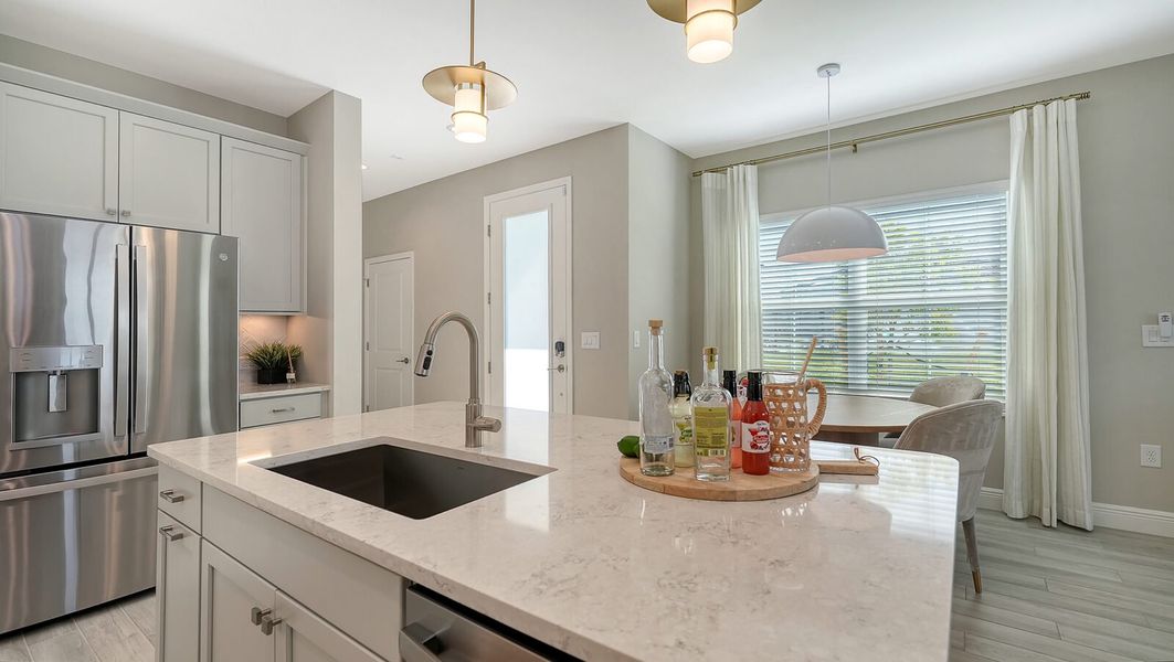 Representative furnished interior of a home built from the Parker by Neal Communities in SkySail, Naples (Image 17).