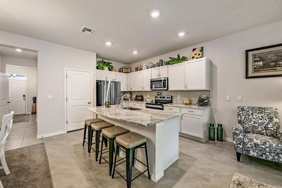 Furnished interior view inside a new home in Azalea Shores, Largo (Image 9).