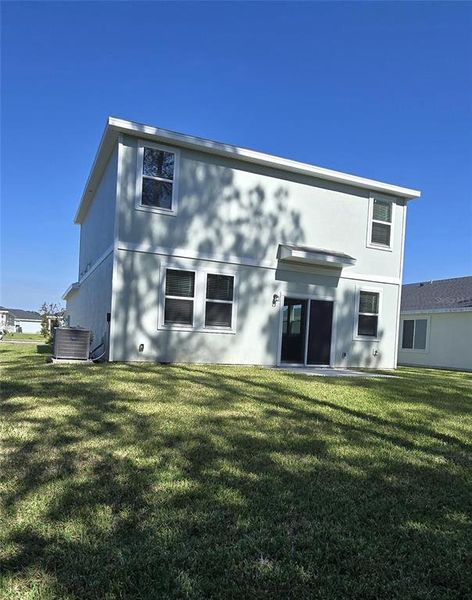 Exterior details and patio area of a home in Flagler Village - Classic Series, Palm Coast (Image 3).