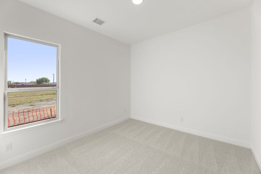 Representative unfurnished interior of a home built from the Del Rio by Windsor Homes in Anna Town Square, Anna (Image 27).