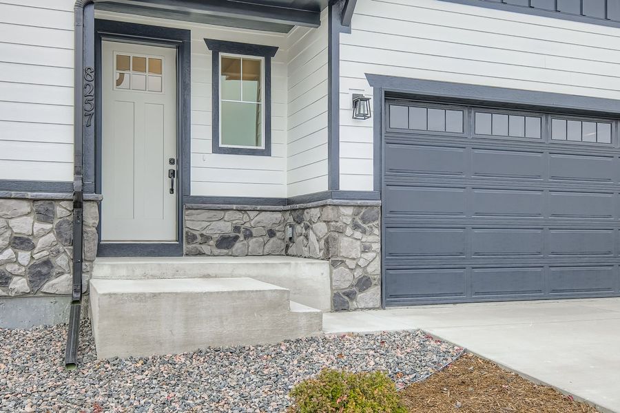 Exterior details and patio area of a home in Sterling Ranch Homestead 50s, Colorado Springs (Image 3).