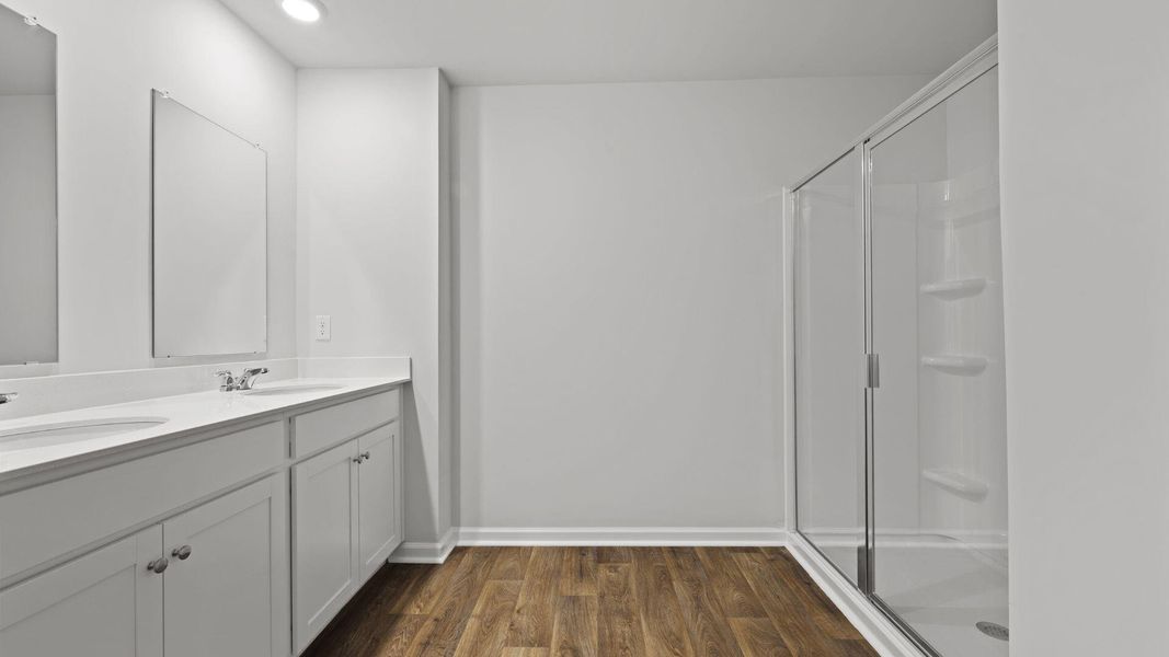 Furnished interior view inside a new home in Pine Hills at Cane Bay, Summerville (Image 8). Furnished interior view inside a new home in Pine Hills at Cane Bay, Summerville (Image 8).