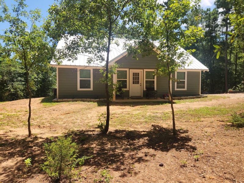 Exterior details and patio area of a home in , Coldspring (Image 24). Exterior details and patio area of a home in , Coldspring (Image 24).