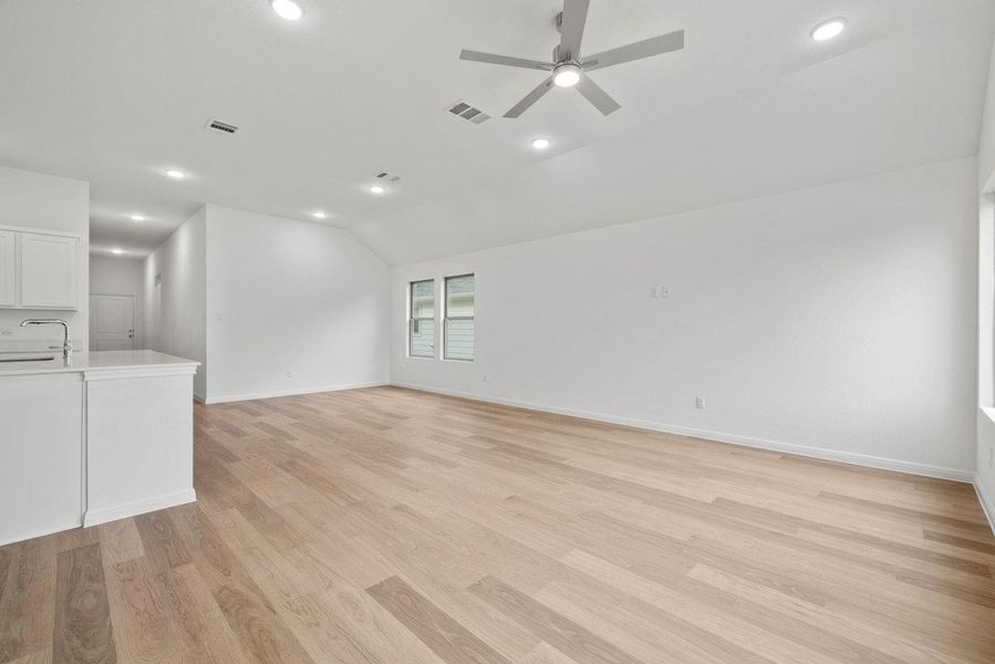Living and Dining Area in the Quartz home plan by Trophy Signature Homes – REPRESENTATIVE Living and Dining Area in the Quartz home plan by Trophy Signature Homes – REPRESENTATIVE