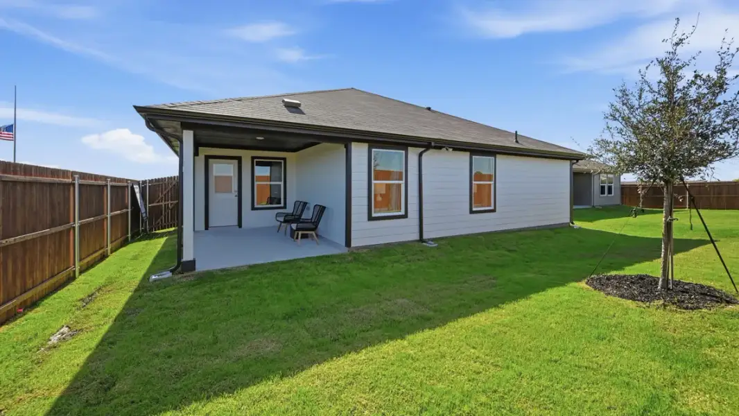 Exterior details and patio area of a home in Hadley Farms, Godley (Image 3).