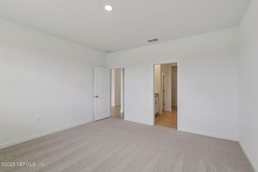 Spacious, unfurnished interior of a new home in Lakes at Bella Lago - Signature Series, Green Cove Springs (Image 24). Spacious, unfurnished interior of a new home in Lakes at Bella Lago - Signature Series, Green Cove Springs (Image 24).