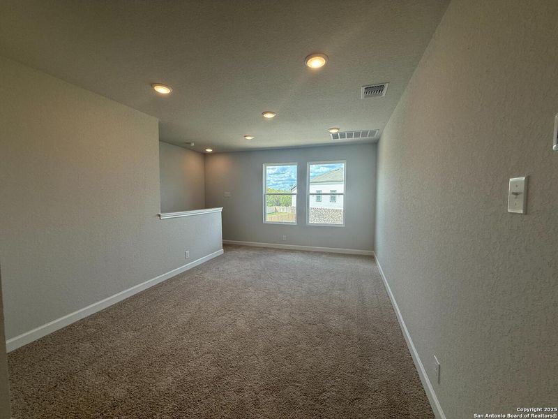 Spacious, unfurnished interior of a new home in The Summit at Saddlebrook Ranch 55's, Schertz (Image 20).