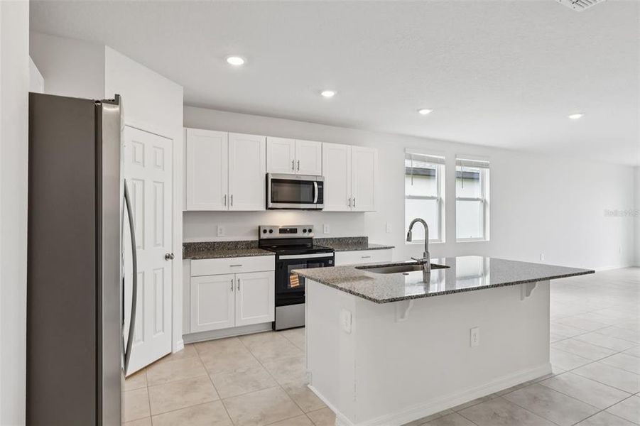 Furnished interior view inside a new home in Lake Deer Estates - Signature Series, Poinciana (Image 7).