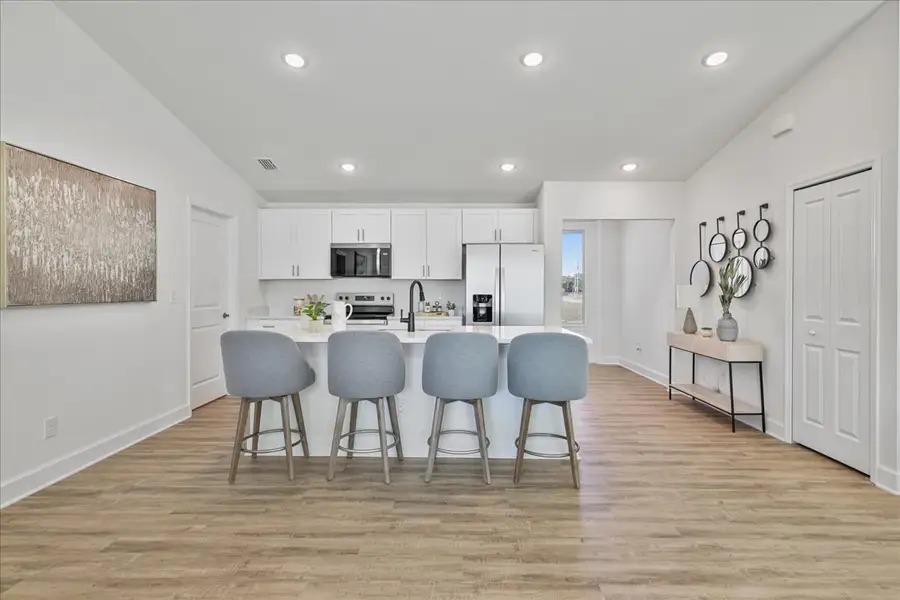 Representative furnished interior of a home built from the The Sunset Harbor by Sunlife Homes LLC in Cape Coral, Cape Coral (Image 4).