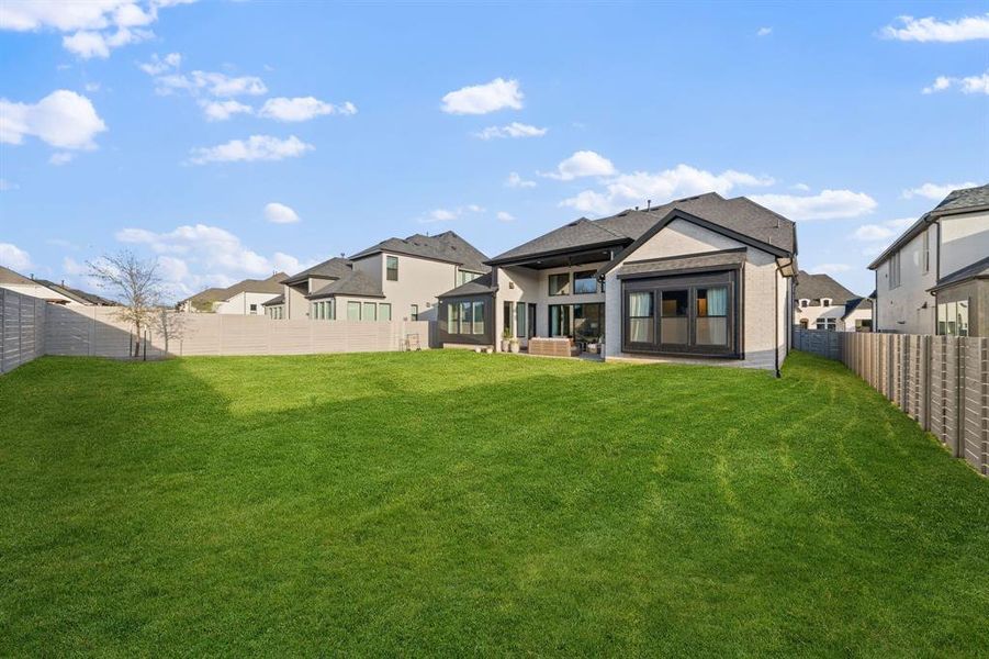 Exterior details and patio area of a home in Painted Tree 60' Series, McKinney (Image 22).