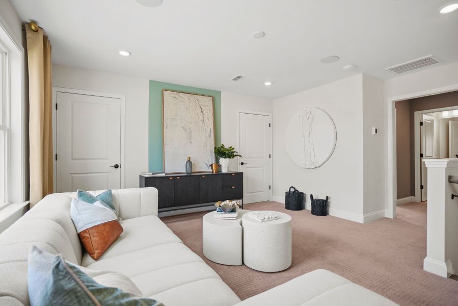 Representative furnished interior of a home built from the Compass by Del Webb in Del Webb Carolina Ridge, Midland (Image 19).