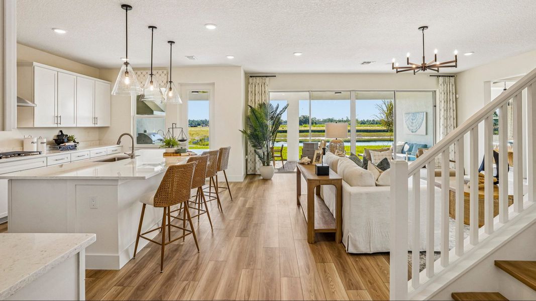 Oleander Floor Plan Kitchen and Living Area by DRB Homes in Ardisia Park in New Smyrna Beach, FL Oleander Floor Plan Kitchen and Living Area by DRB Homes in Ardisia Park in New Smyrna Beach, FL