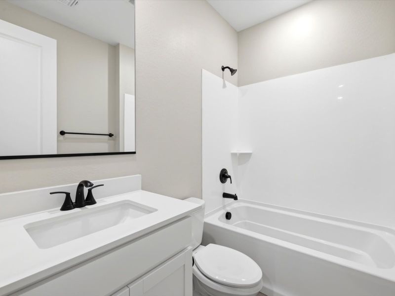 Furnished interior view inside a new home in White Tank Foothills Signature Series, Waddell (Image 9).