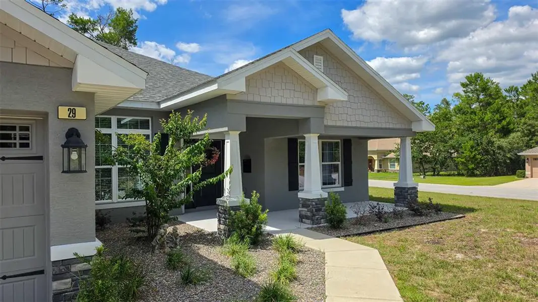 Front exterior of a new home in , Homosassa, FL, highlighting curb appeal (Image 27).