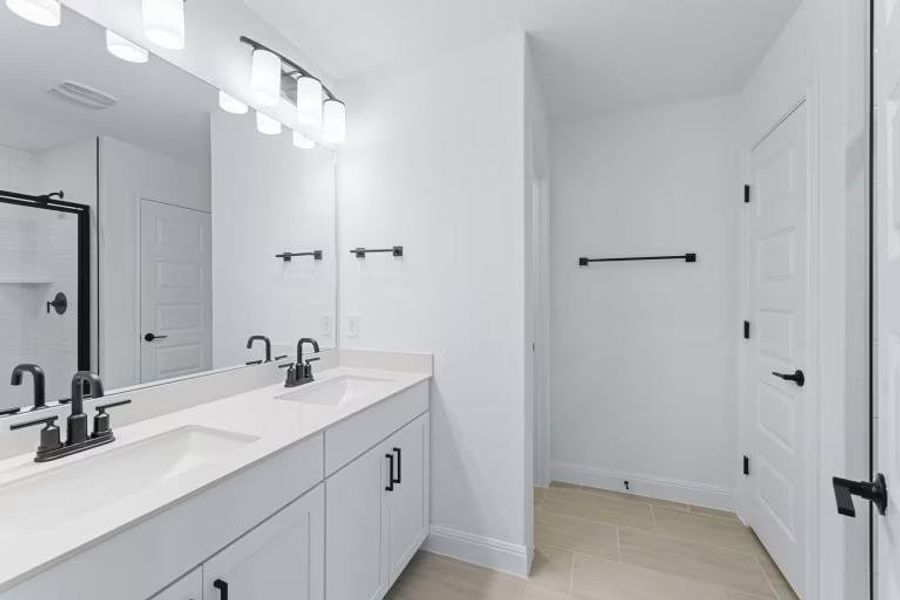 Photo of Pulte model home with same floor plan, not of actual home listed.