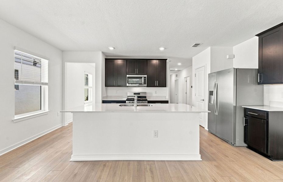 Furnished interior view inside a new home in Twisted Oaks, Wildwood (Image 6).