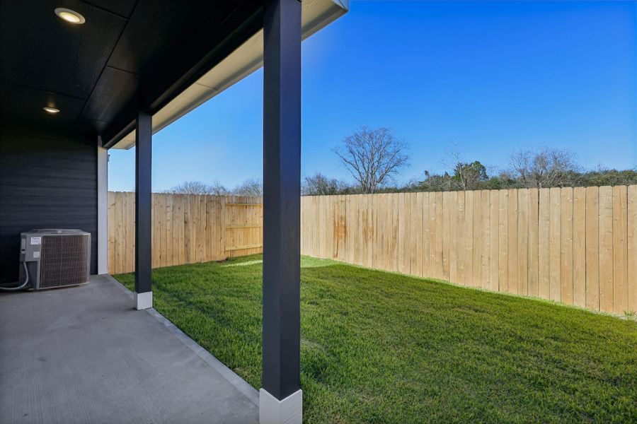 Exterior details and patio area of a home in Kemah Crossing - City Series, Kemah (Image 2). Exterior details and patio area of a home in Kemah Crossing - City Series, Kemah (Image 2).