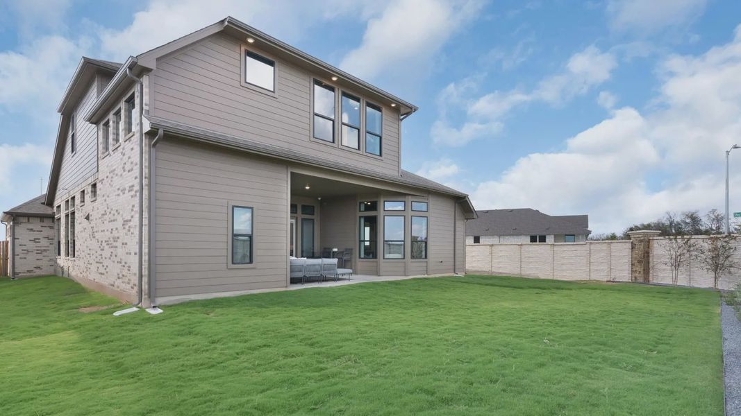 Exterior details and patio area of a home in Newhaven, Manor (Image 19).