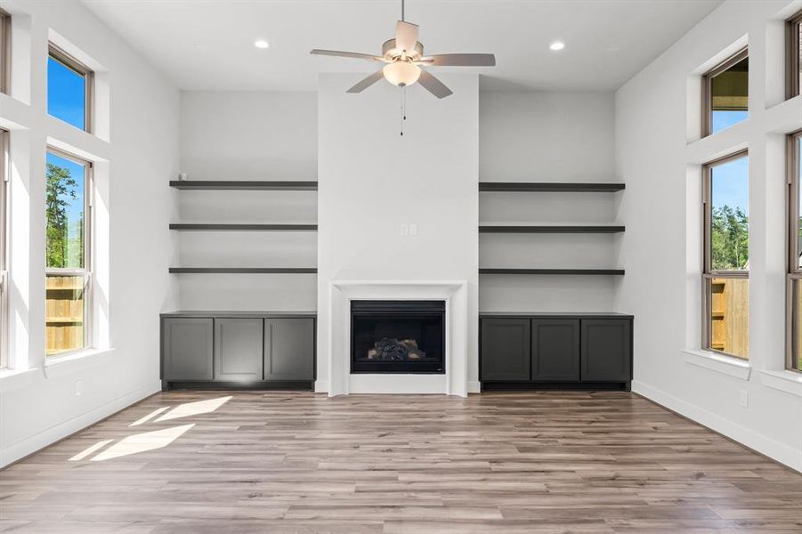 Built-in Storage, Gas Fireplace, and Floating Shelving.