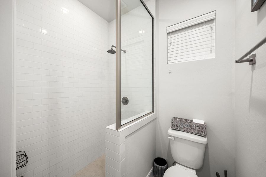 Furnished interior view inside a new home in The Corner At Buffalo Pointe, Houston (Image 9).