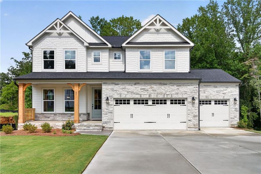 Front exterior of a new home in Arbor West, Dawsonville, GA, highlighting curb appeal (Image 2).