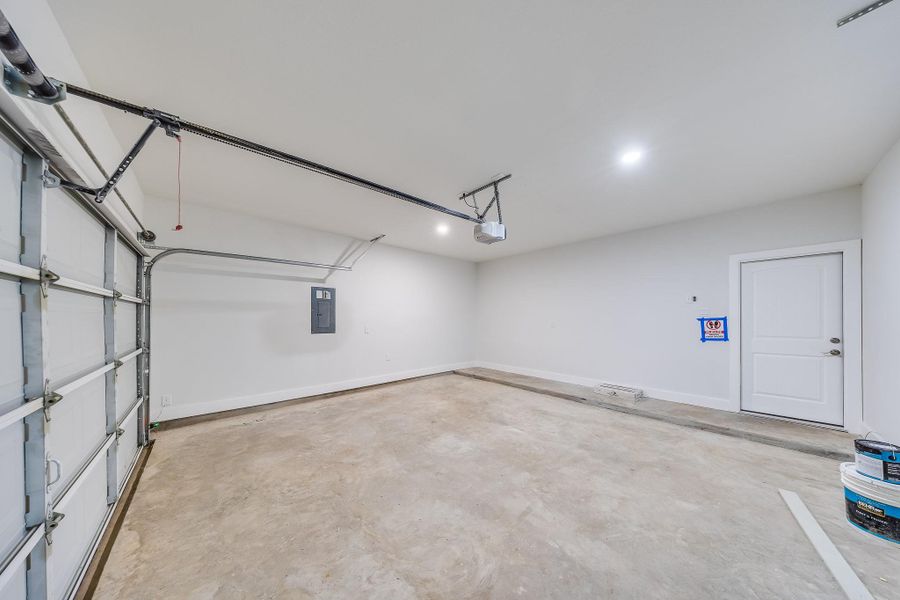 Double garage offers ample space and a blank canvas for your custom storage or workshop ideas. Double garage offers ample space and a blank canvas for your custom storage or workshop ideas.