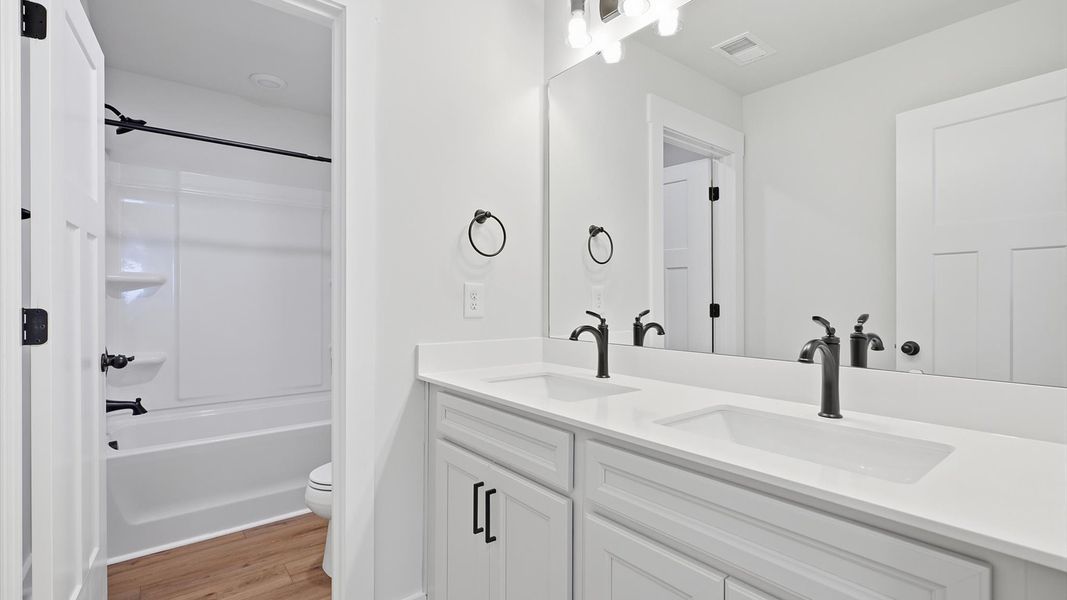 Well-appointed full bath with high standards of craftsmanship and everyday function