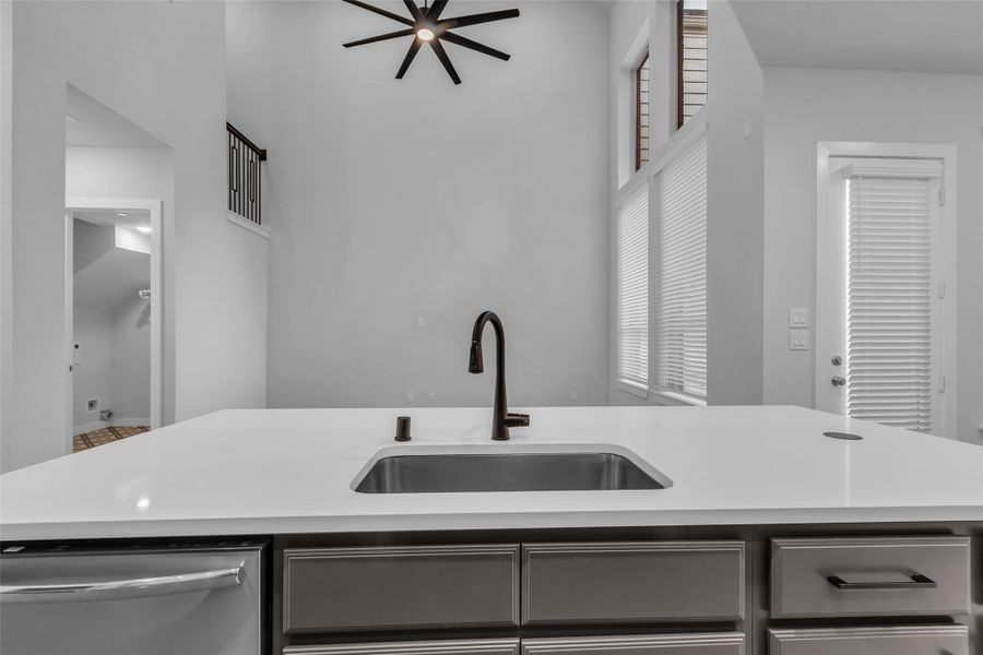 Large stainless steel single basin undermount sink.