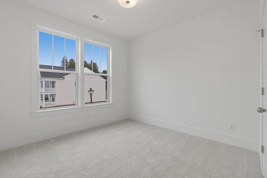 Spacious, unfurnished interior of a new home in Homecoming, Ravenel (Image 21).