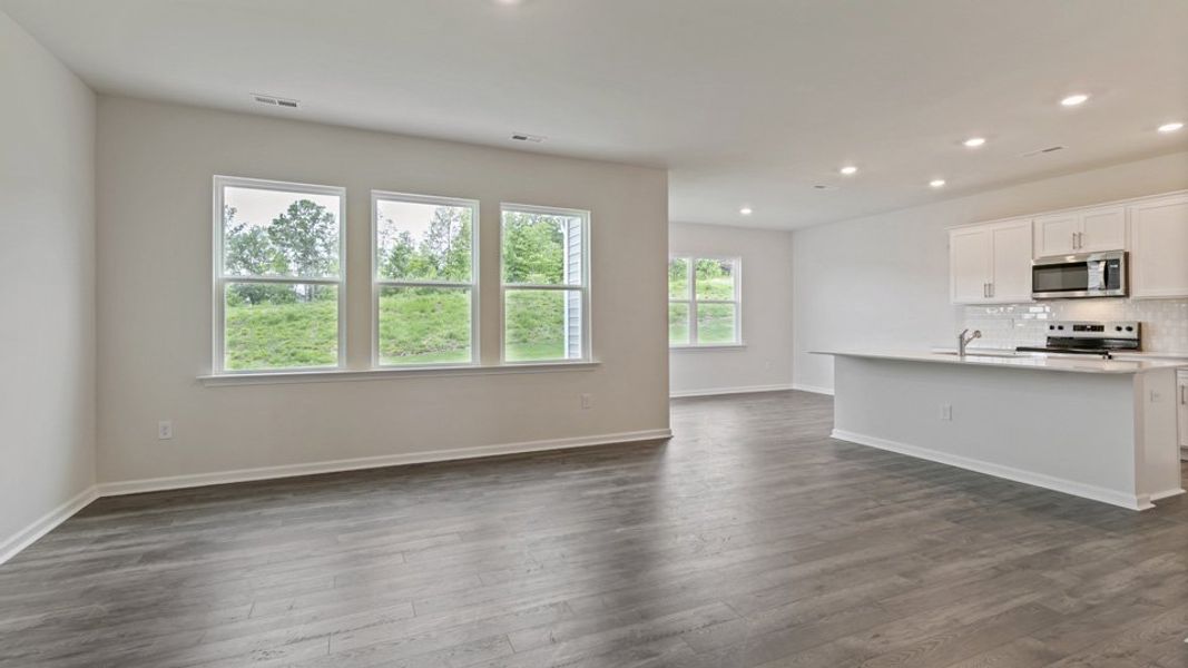 Representative unfurnished interior of a home built from the DARWIN by D.R. Horton in Honeycutt Oaks, Angier (Image 9). Representative unfurnished interior of a home built from the DARWIN by D.R. Horton in Honeycutt Oaks, Angier (Image 9).