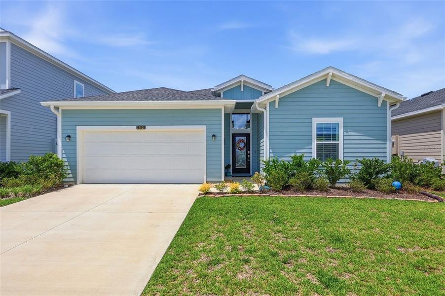 Front exterior of a new home in Trailhead Landing, Alachua, FL, highlighting curb appeal (Image 2).