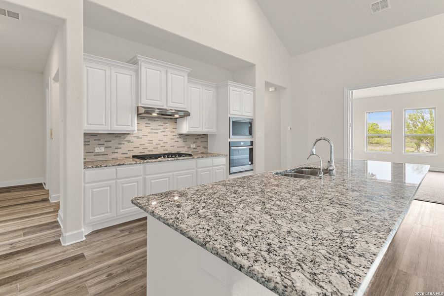 Furnished interior view inside a new home in Legend Park, Castroville (Image 7).