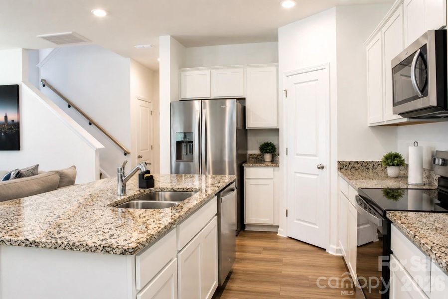 Furnished interior view inside a new home in Autumn Park, Concord (Image 13).