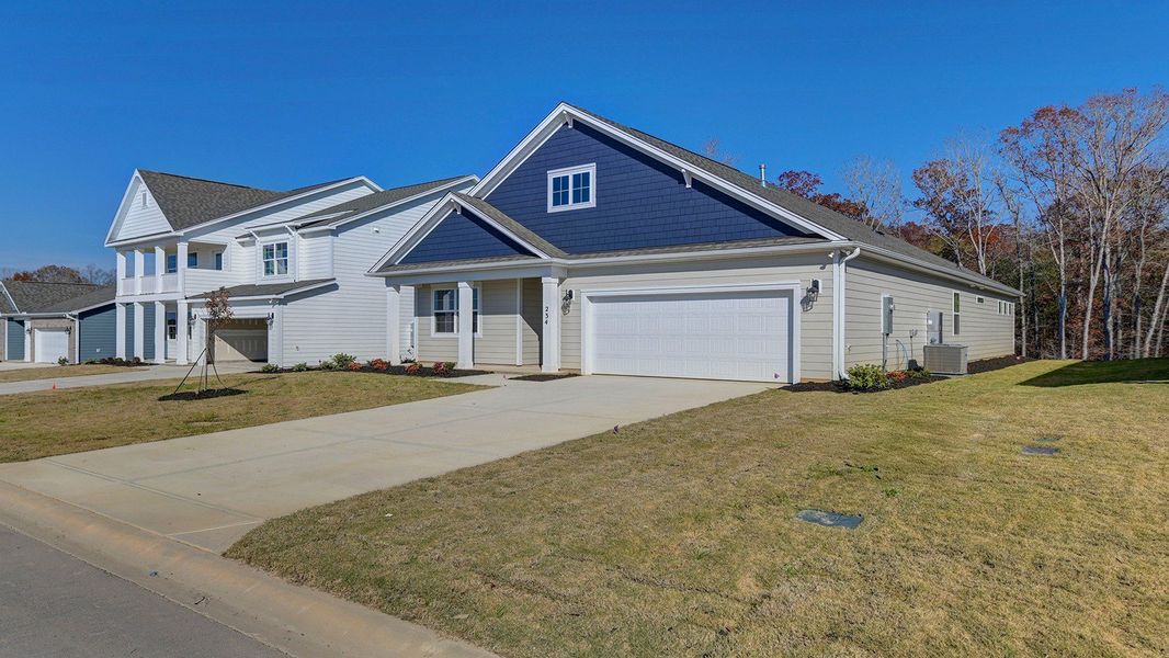 Front exterior of a new home in Livingston Woods, Irmo, SC, highlighting curb appeal (Image 23).
