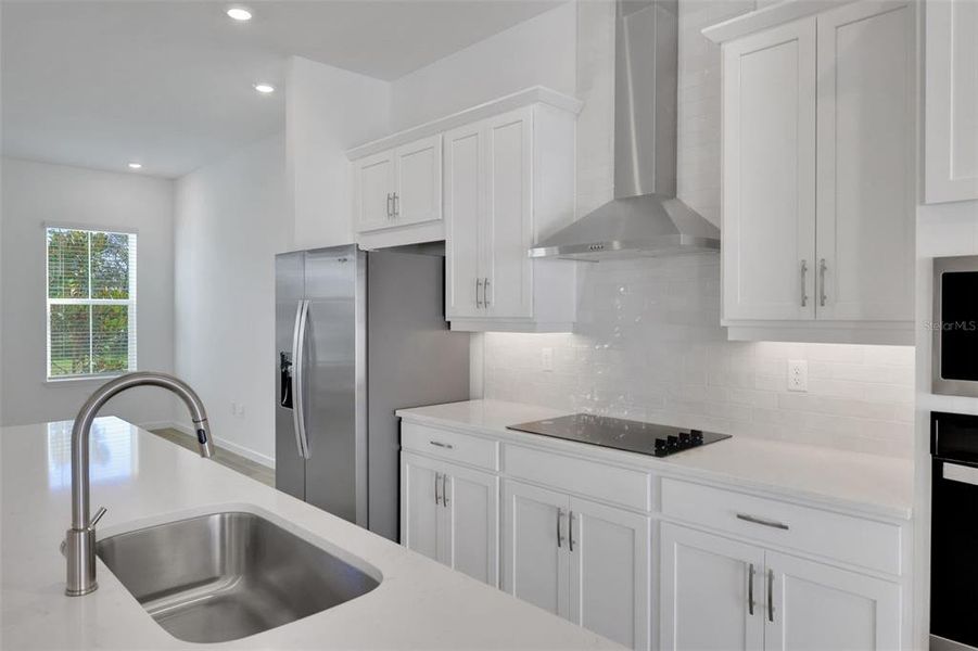 Furnished interior view inside a new home in Serenade at Ovation, Winter Garden (Image 16).