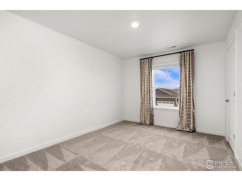 Spacious, unfurnished interior of a new home in Vantage, Berthoud (Image 36).