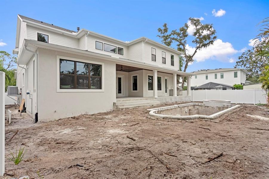 Front exterior of a new home in , Tampa, FL, highlighting curb appeal (Image 2).