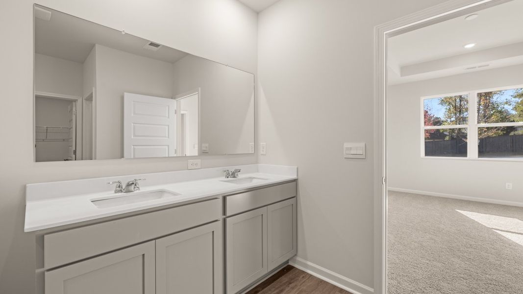 Representative furnished interior of a home built from the CALI Express by D.R. Horton in Teamon Pointe, Griffin (Image 8).