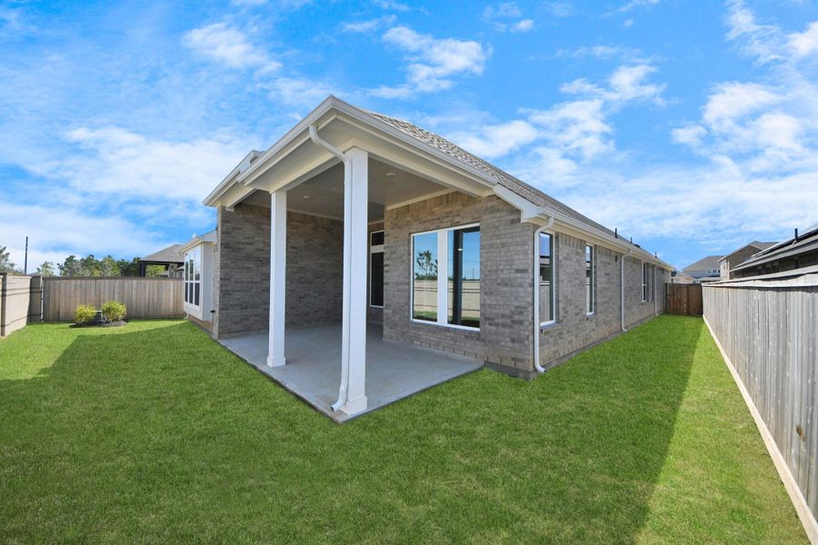 Front exterior of a new home in Bridgeland: Heritage Collection, Cypress, TX, highlighting curb appeal (Image 15). Front exterior of a new home in Bridgeland: Heritage Collection, Cypress, TX, highlighting curb appeal (Image 15).