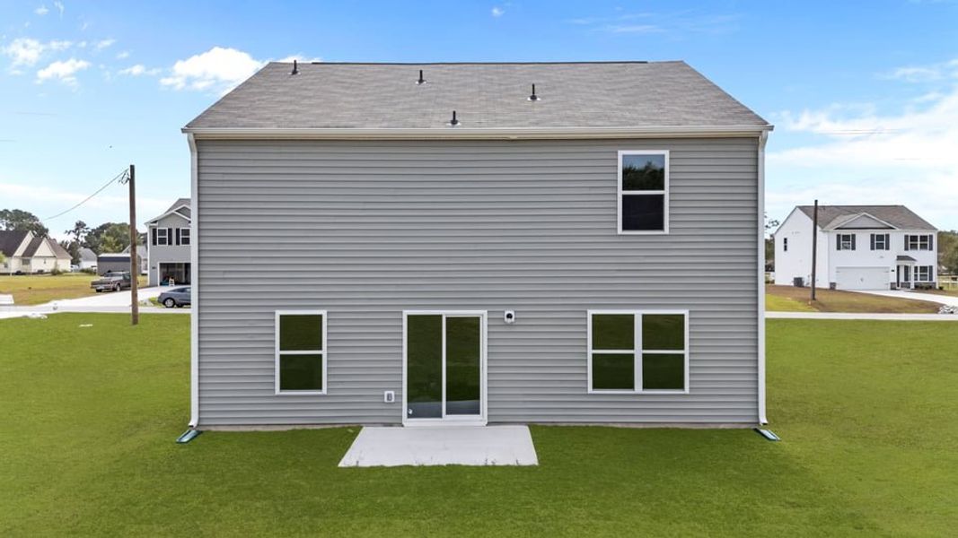 Exterior details and patio area of a home in Madeline Farm, New Bern (Image 19).