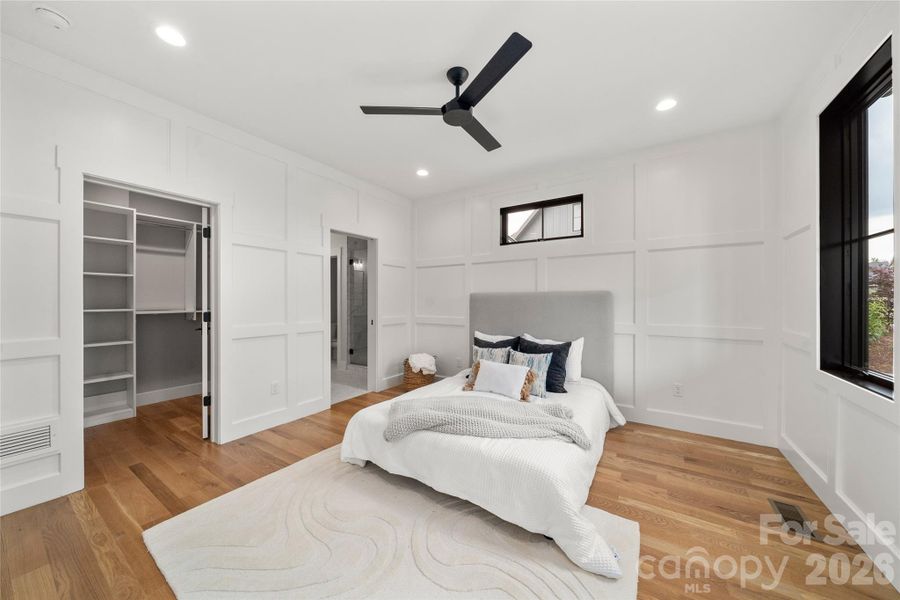 Primary on main w. featured wainscoting walls