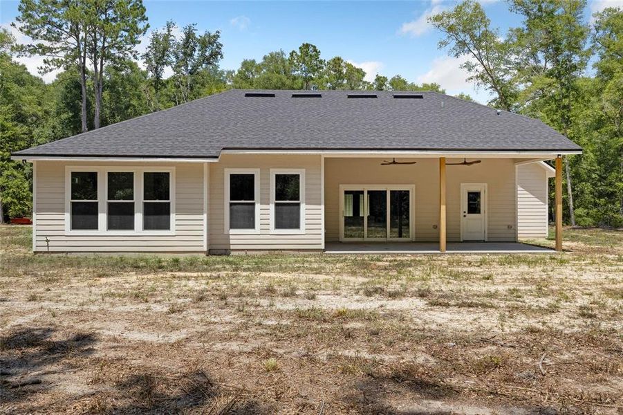 Exterior details and patio area of a home in , Alachua (Image 25).